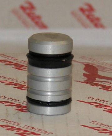 PISTON WITH PACKINGS FOR CLUTCH SLAVE CYLINDER